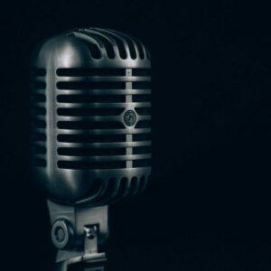 Interview microphone with black background.